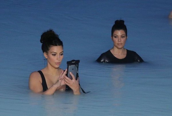 kim-kardashian-in-water-with-phone